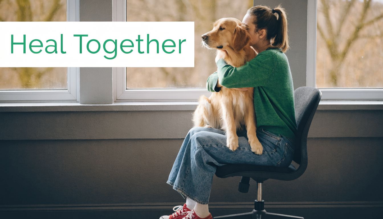 A young woman sitting on a chair, hugging a friendly golden retriever dog for emotional support.